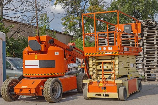 warehouse worker operating a heavy-duty forklift in Maumelle